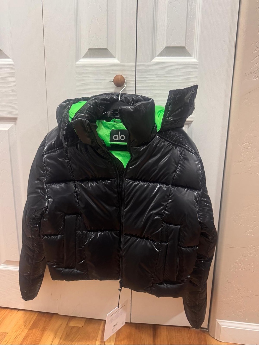 ALO Yoga Black Puffer Jacket with Neon Green Hood Lining
